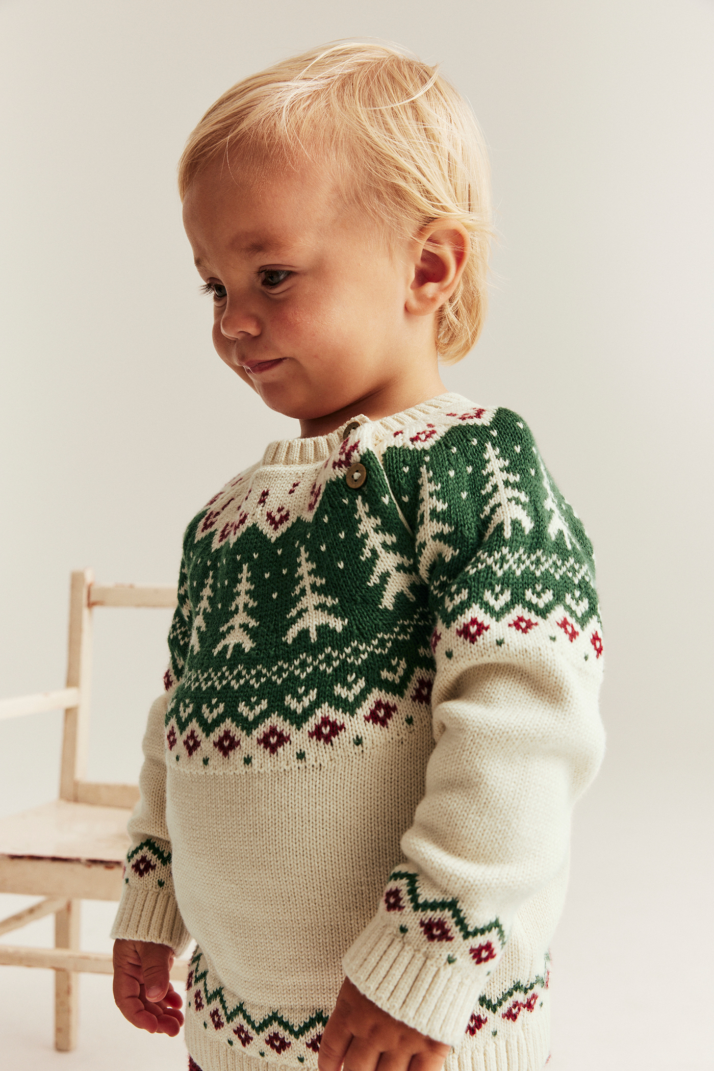 Knitted Christmas sweater with spruce trees | Off-white | Baby