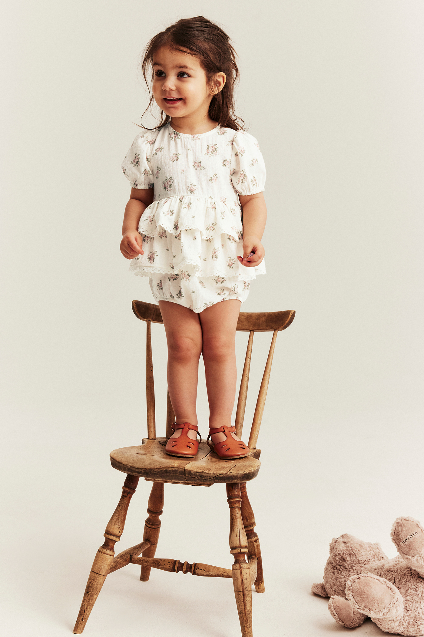 Floral jumpsuit with frill | Off-white | Baby | Newbie