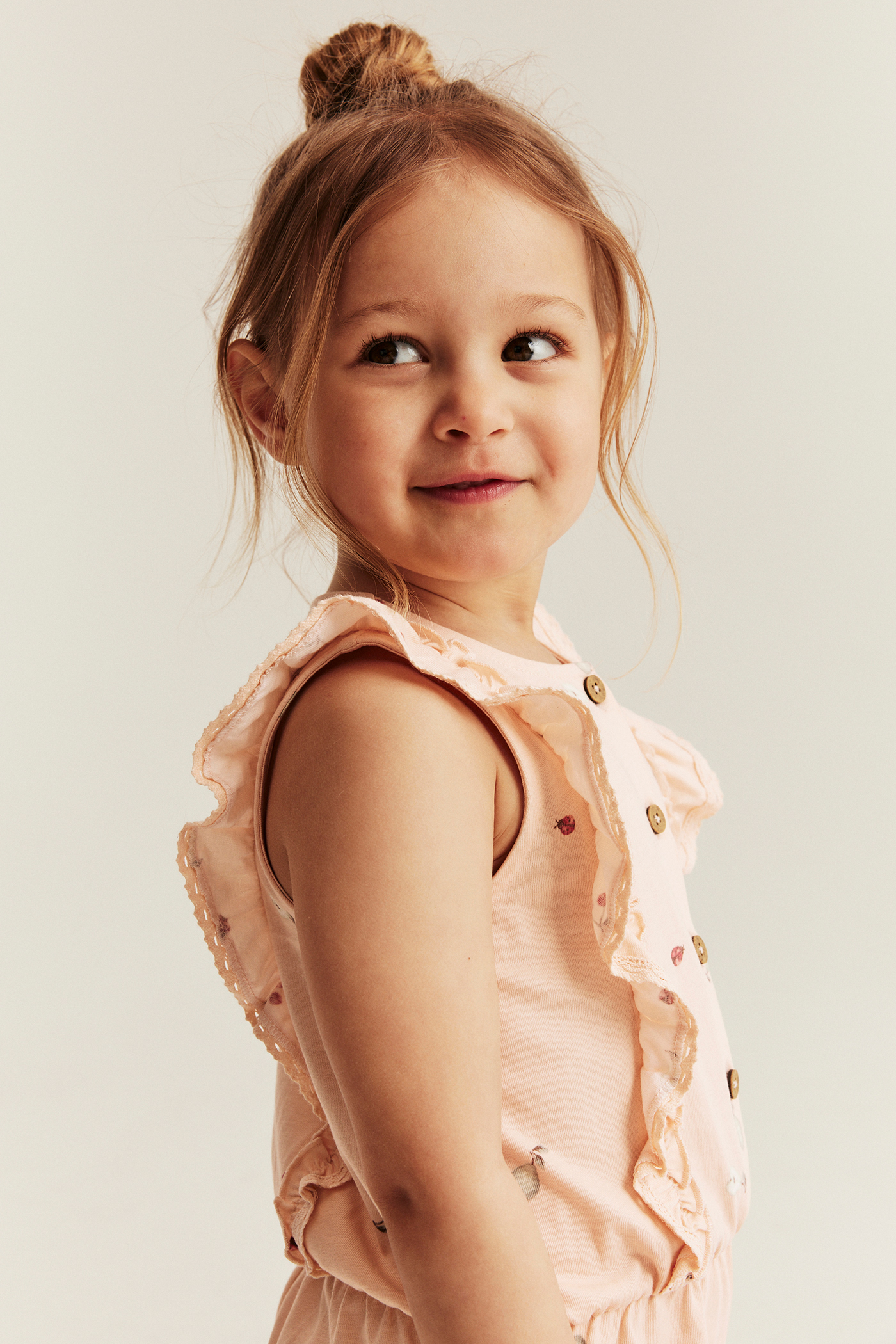 Patterned jumpsuit with frills | Orange | Kids | Newbie